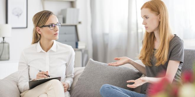 a young woman talking to her therapist